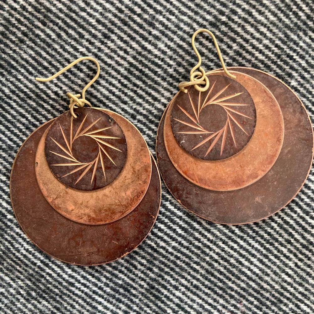 Bronze circle drop etched earrings.